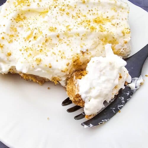 A delicious pineapple dream dessert om a fork.