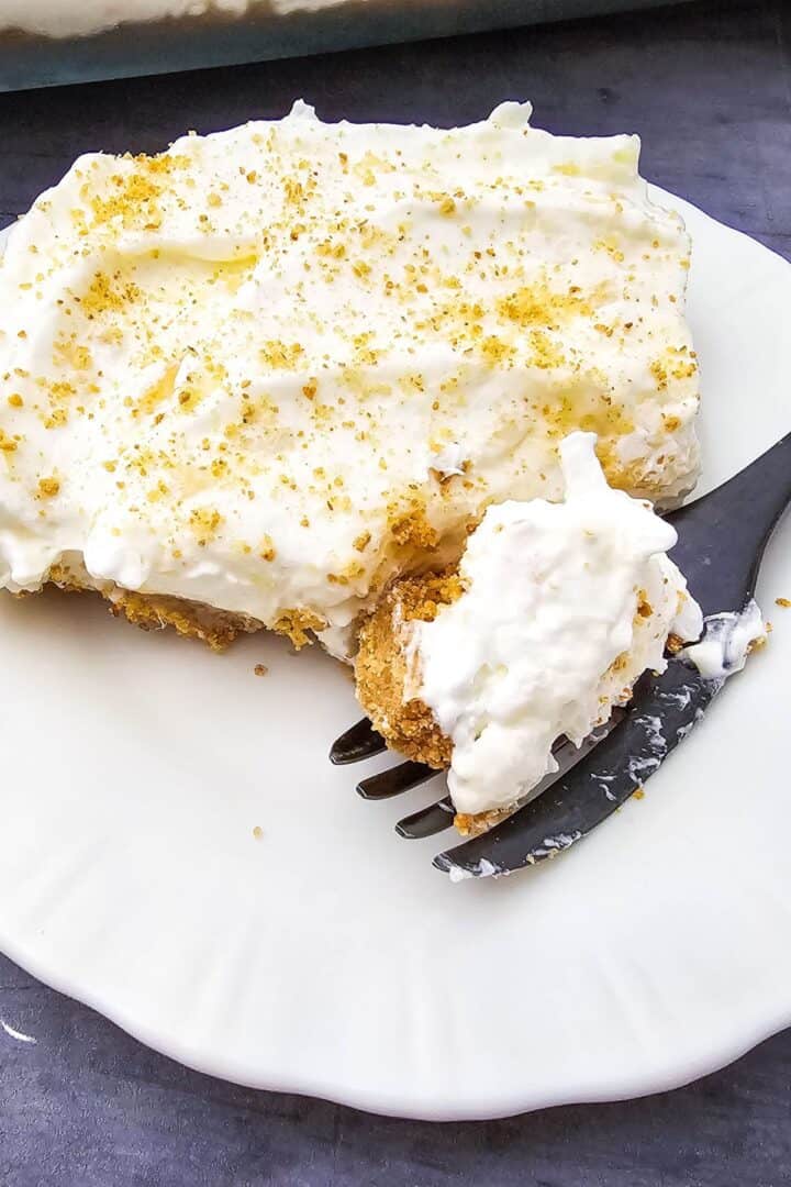 A delicious pineapple dream dessert om a fork.