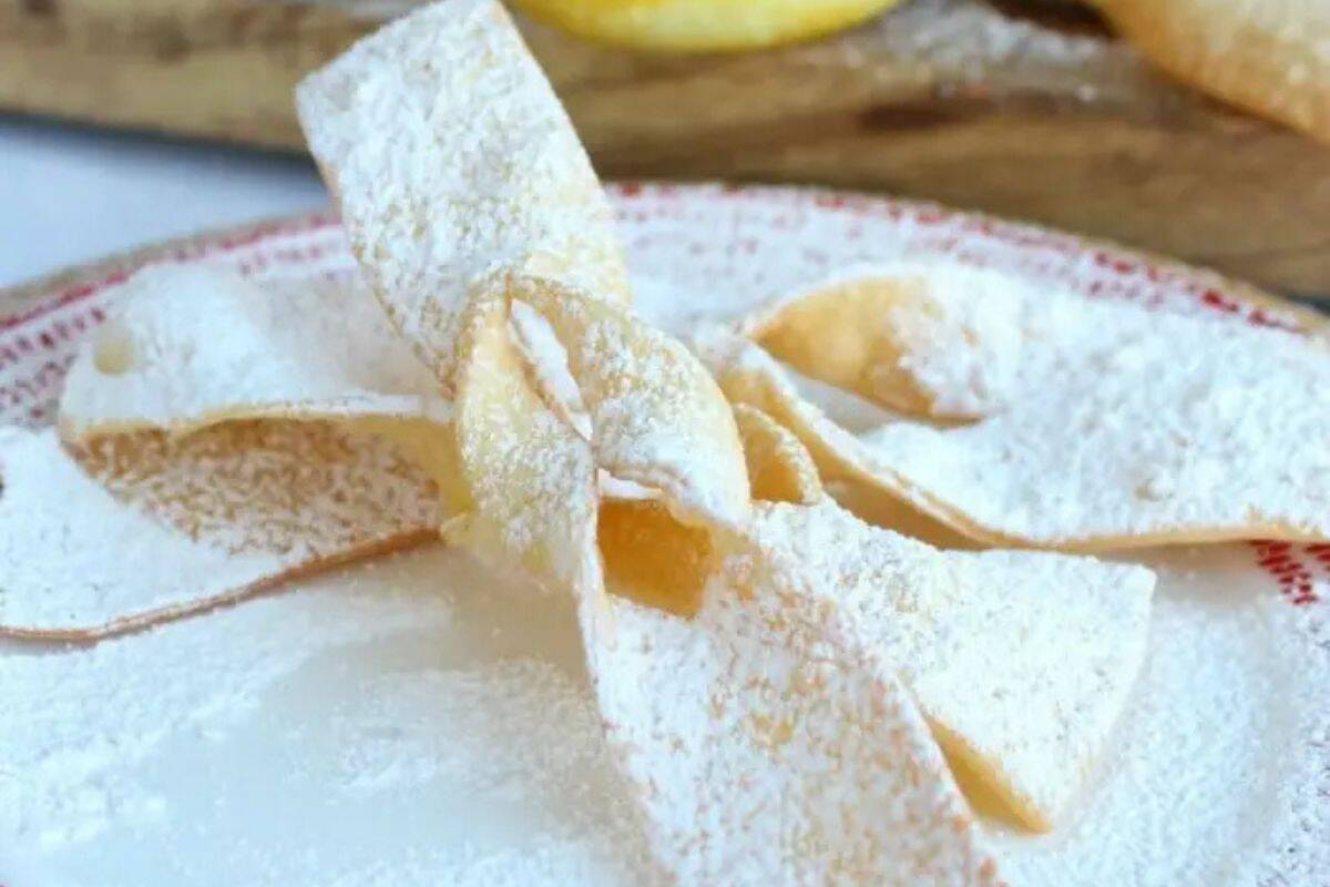 Thin, twisted fried pastries dusted with powdered sugar.