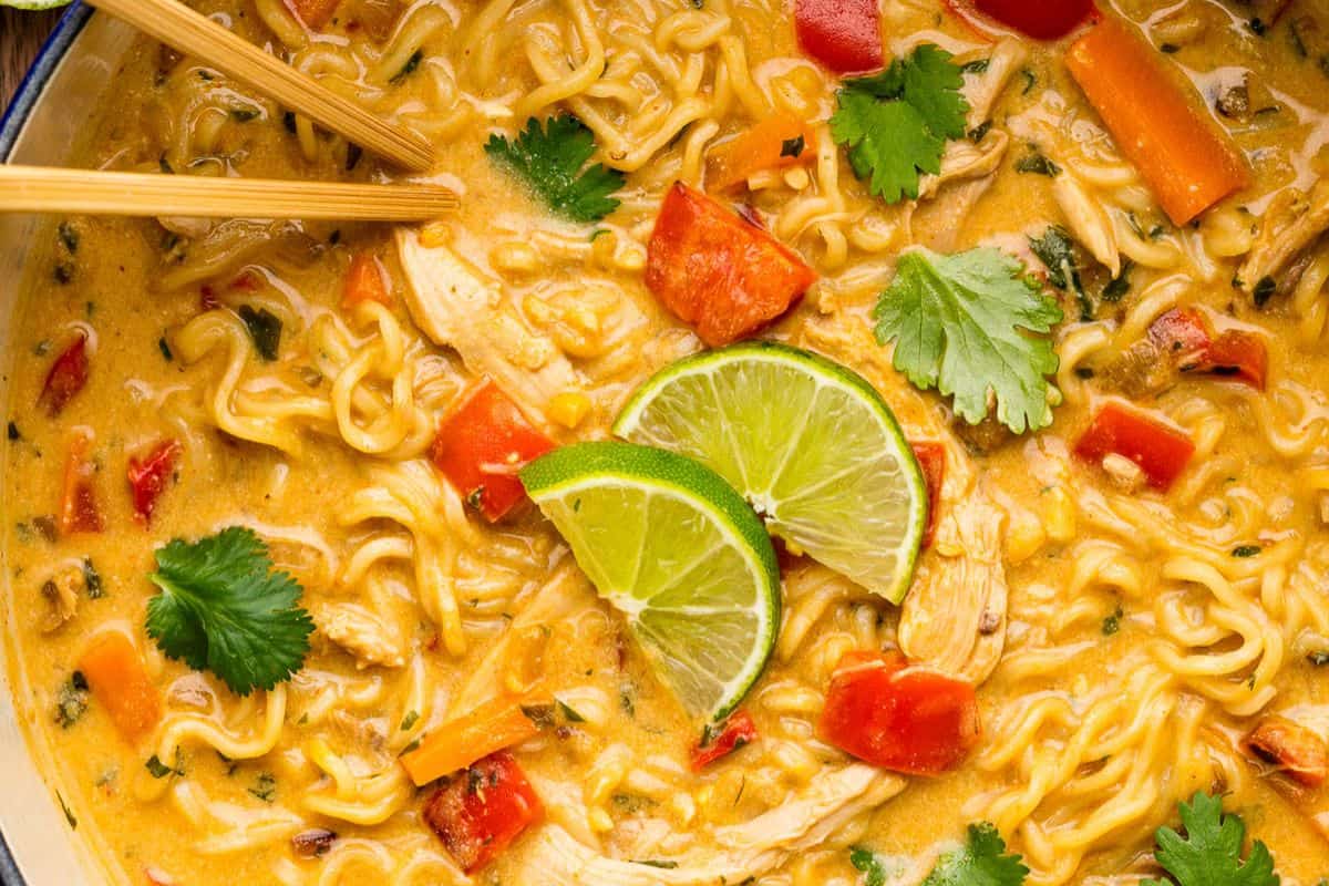 A bowl of soup with chopsticks and vegetables, this flavor packed ramen is perfect for those seeking easy ramen recipes with a delicious twist.