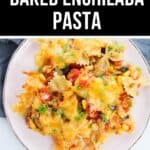 A plate of Enchilada Pasta made with bowtie noodles, cheese, corn, black beans, tomatoes, and herbs is served on a white plate.