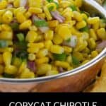 A close-up of a bowl filled with corn salsa made of corn, red onion, cilantro, and peppers, with the text "Copycat Chipotle Corn Salsa Recipe" below the image.