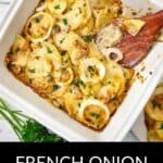 A square baking dish filled with sliced potatoes and onions, topped with melted cheese and herbs, showcases a classic Potato Bake, with a wooden spoon scooping a hearty portion.