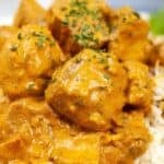 Close-up of creamy chicken curry served over rice with the text "30 30 Minute Chicken Recipes You'll Love" at the bottom, perfect for fans of quick chicken meals and easy 30 minute chicken dinners.