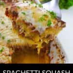 A slice of Spaghetti Squash Lasagna is being lifted from a baking dish, topped with melted cheese and fresh parsley.