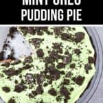 A glass pie dish with Oreo Pudding Pie, featuring mint green pudding and crumbled Oreo cookies on top, with one slice removed.