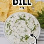 A bowl of creamy dill dip garnished with fresh dill sits surrounded by ruffled potato chips on a striped cloth. Text on image reads "Easy Dill Dip, Creamy." Perfect for parties or snacking!.