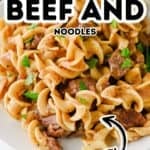 A plate of hearty crock pot beef and noodles garnished with parsley, with text overlay reading “Crock Pot Beef and Noodles” and a hand-drawn arrow pointing to the food.